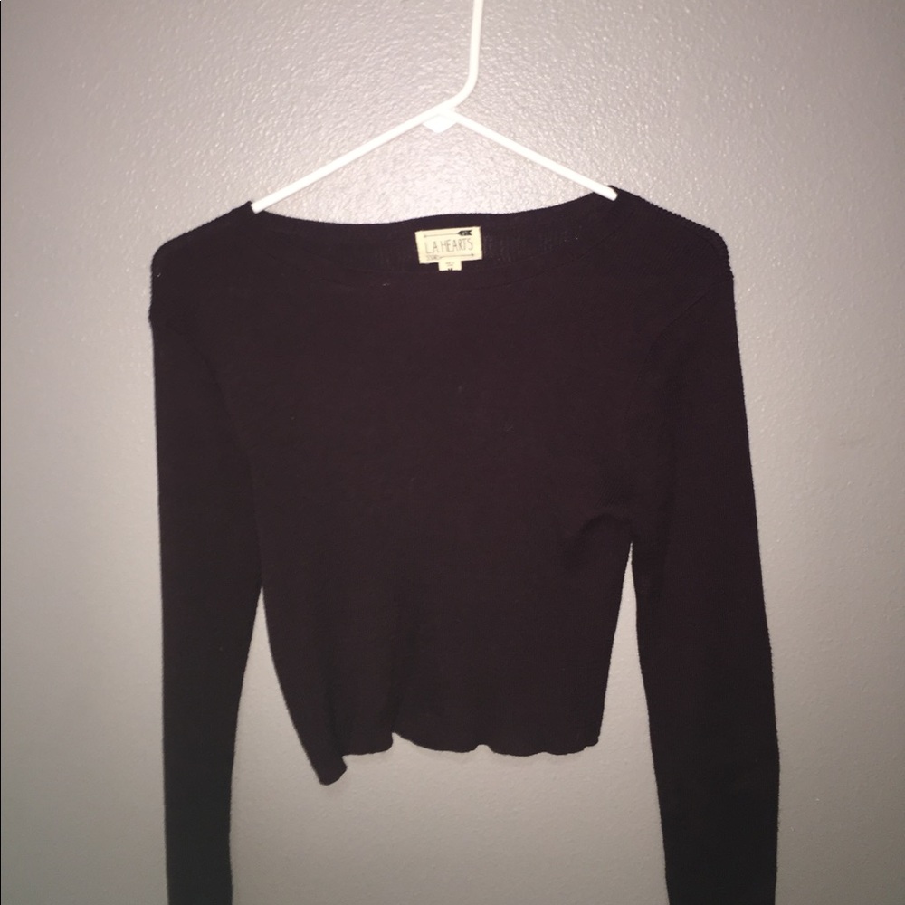cropped maroon long sleeve shirt.