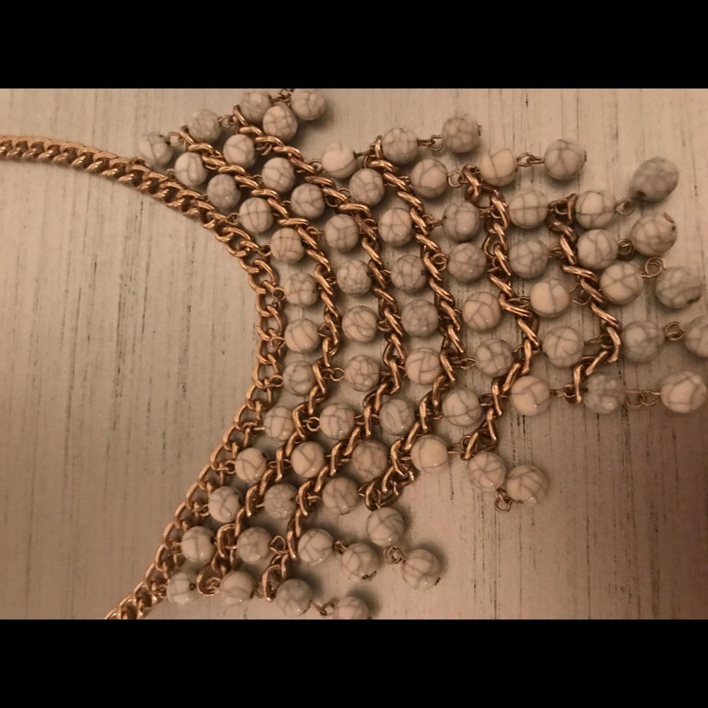 Gold and white bib necklace