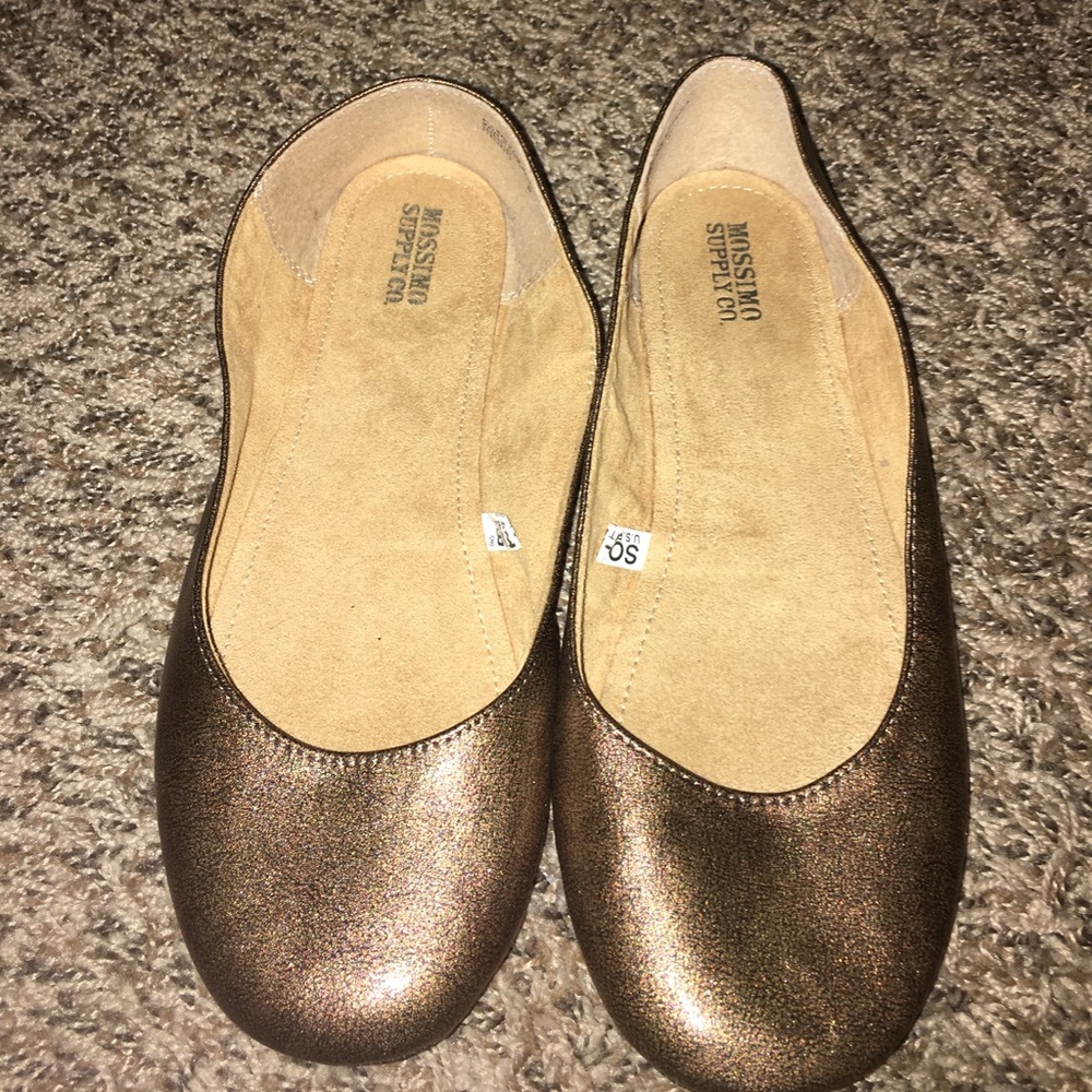gold/brown flats