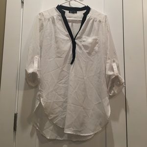 Sheer white blouse with black detail