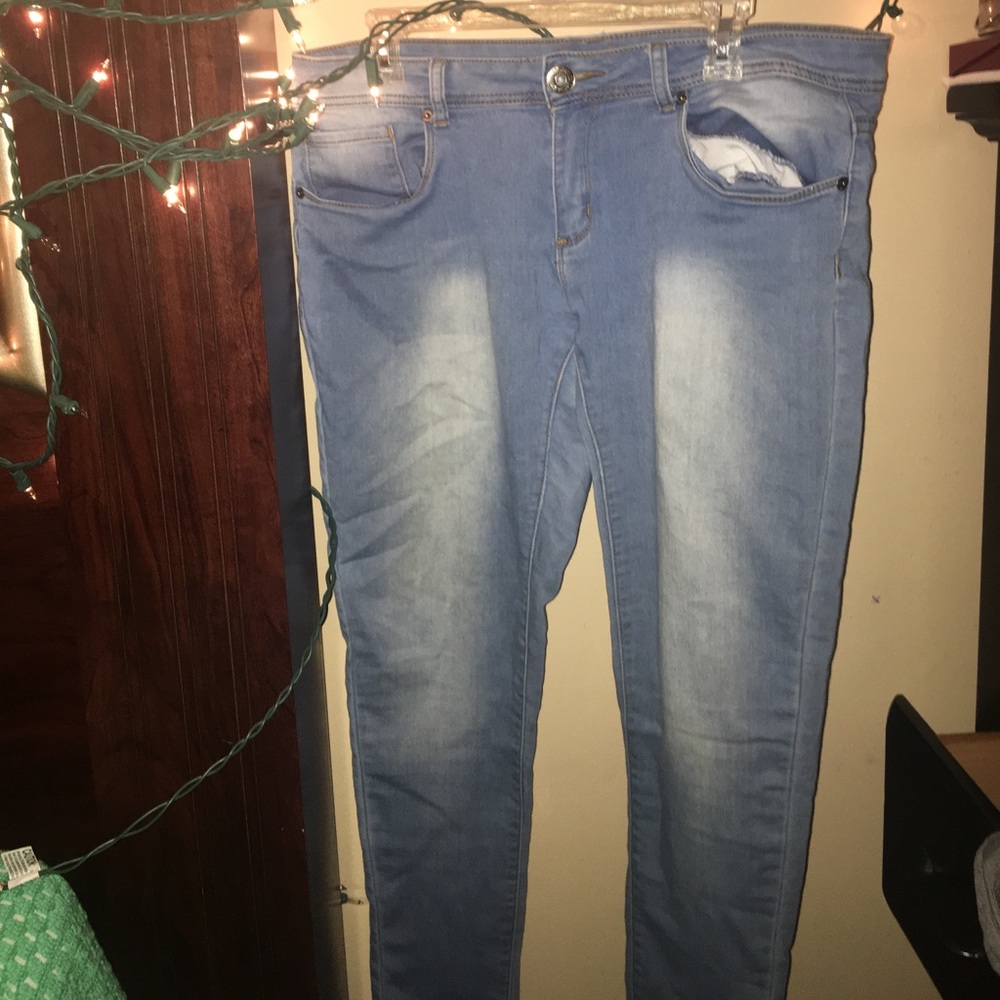 a pair of low rise skinny jeans