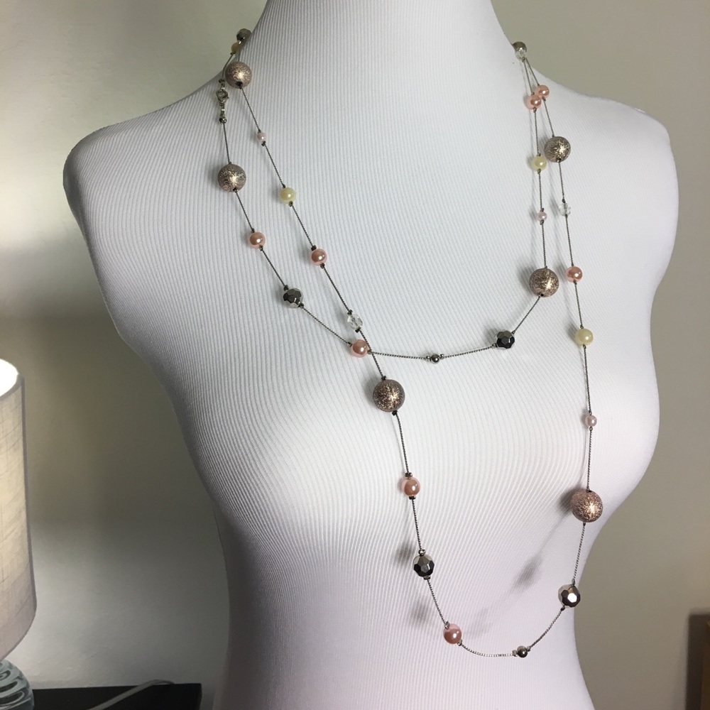 Pink beaded chain.
