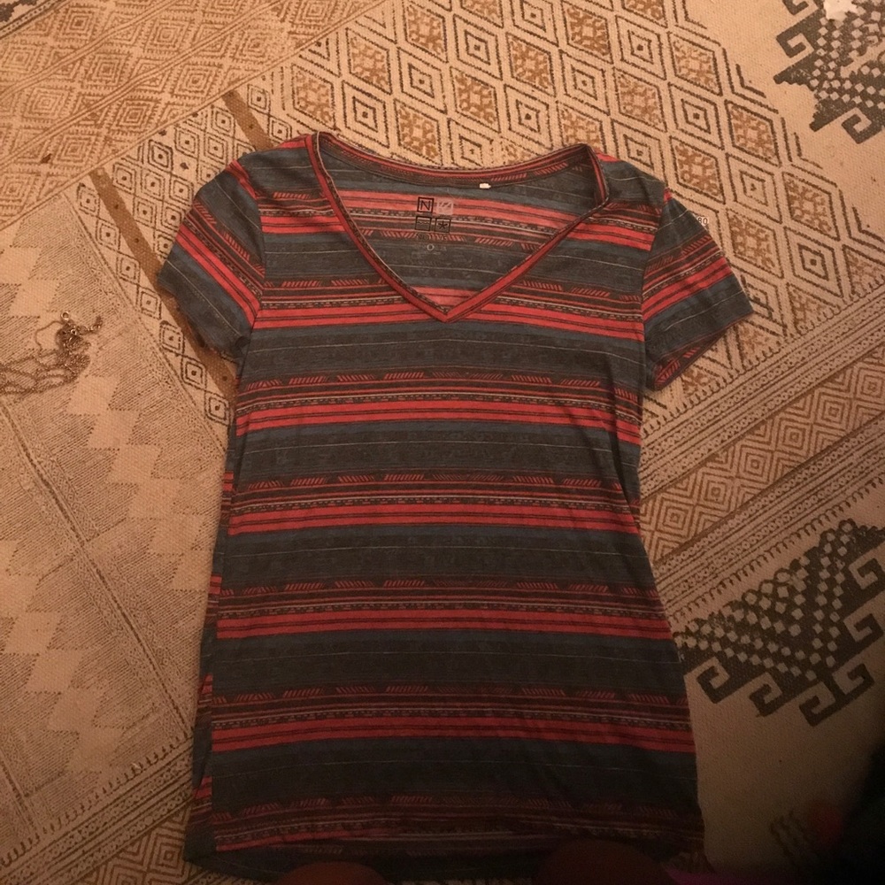 nollie tshirt, lightly worn, very good condition