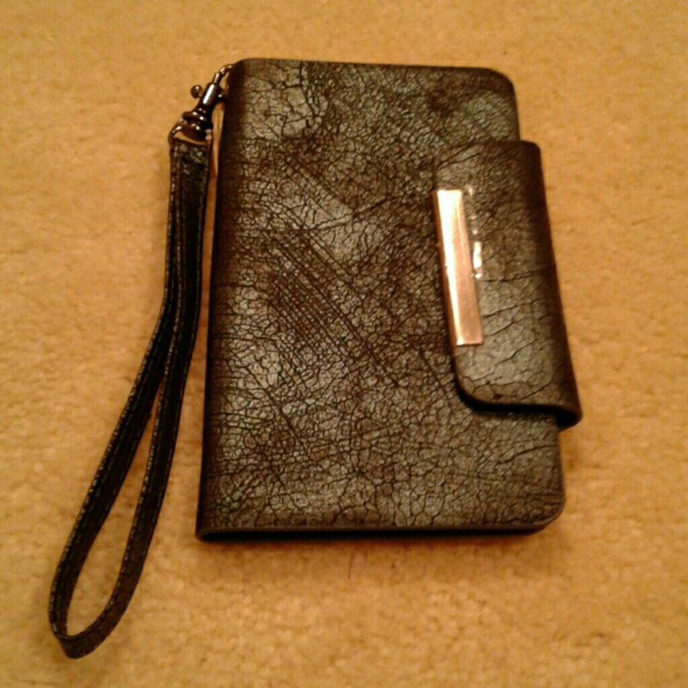 Metallic finish suction cup phone wristlet