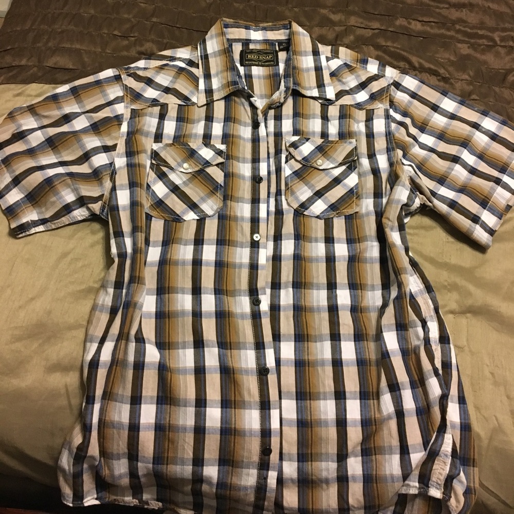 Red snap short sleeve shirt.