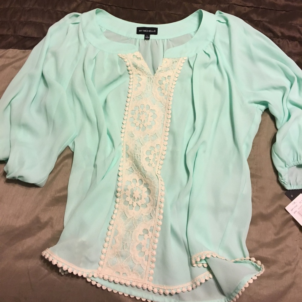 Mint and cream blouse