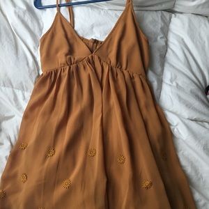 Burnt orange dress with flower embroidery