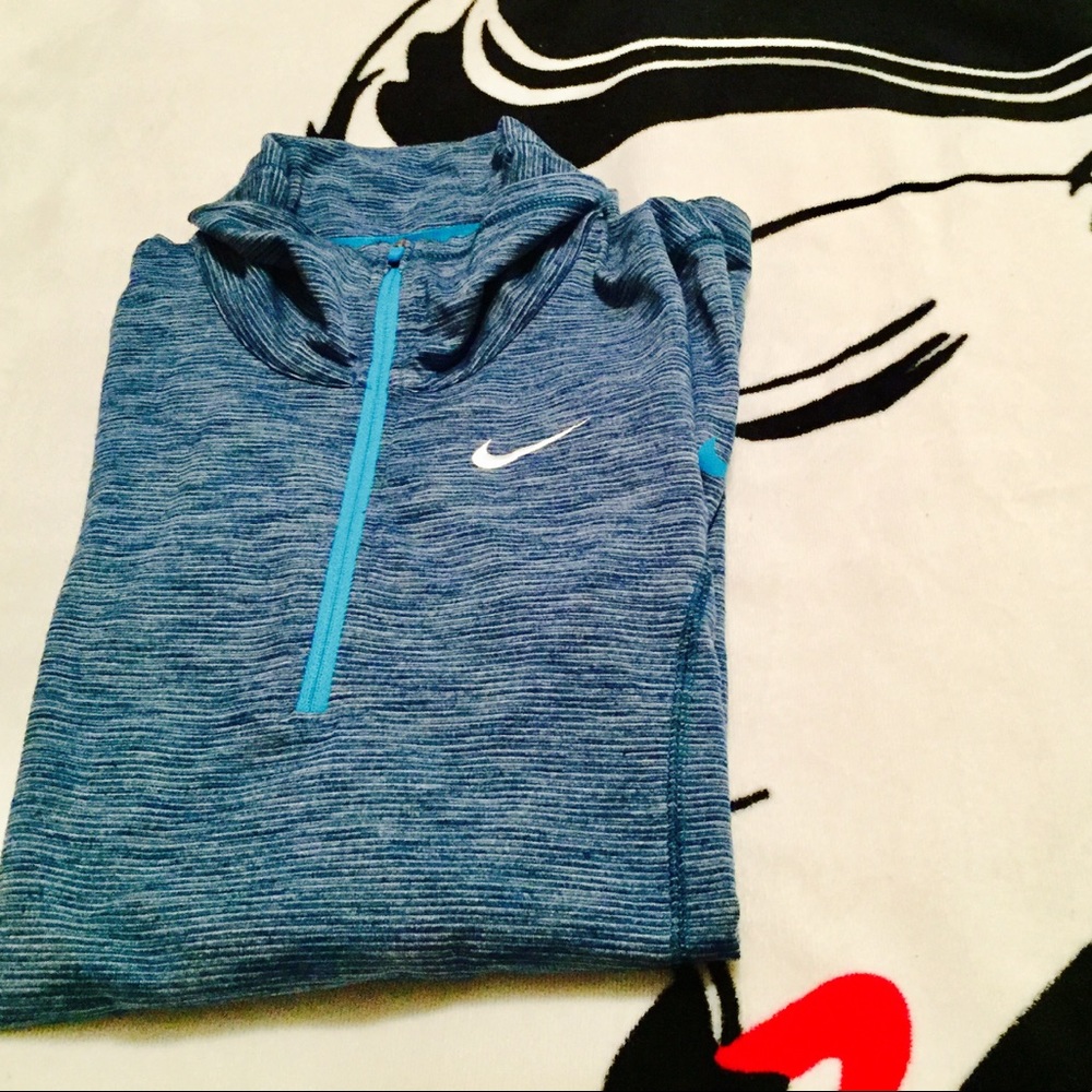 Nike golf tour performance long sleeve shirt.