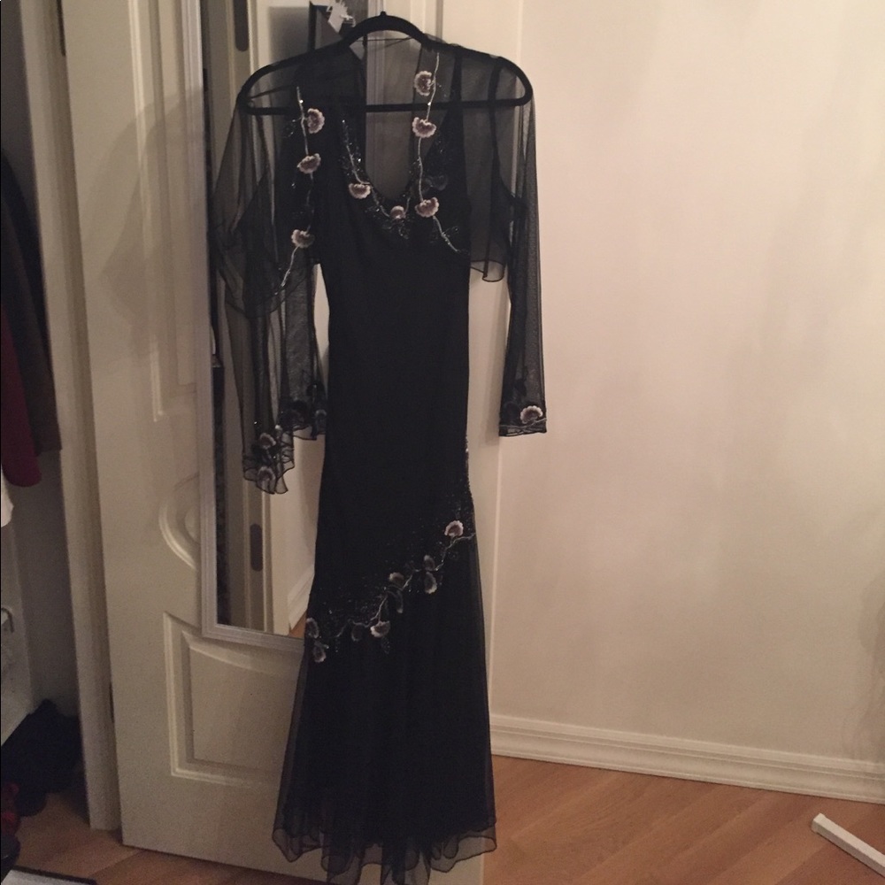 Beautiful embellished Xscape gown