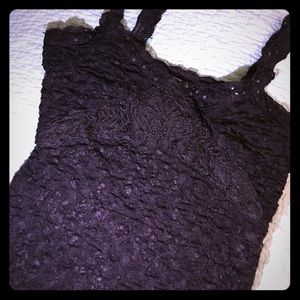 Sexy black cami with lace and beading detail!