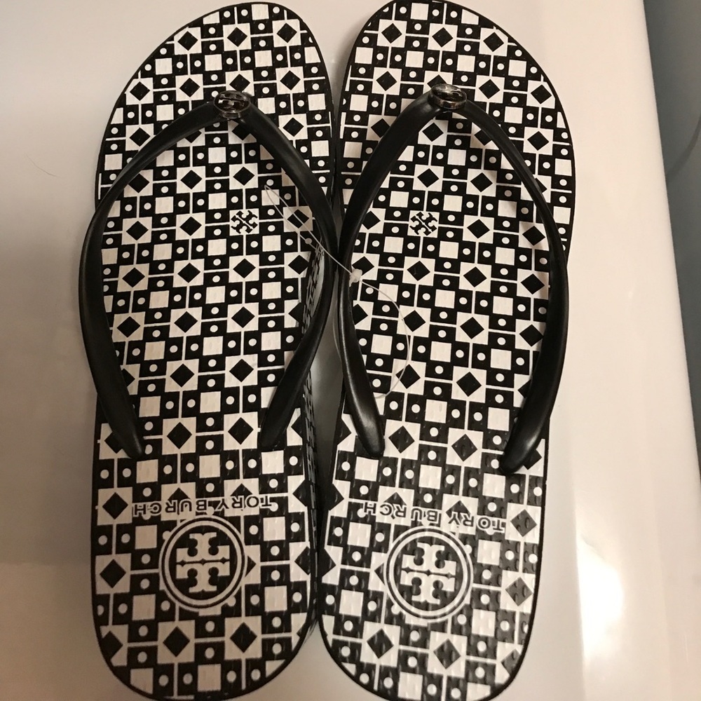 Authentic Tory Burch flip flops NEVER WORN!