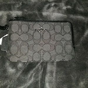 Coach signature double pocket wristlet