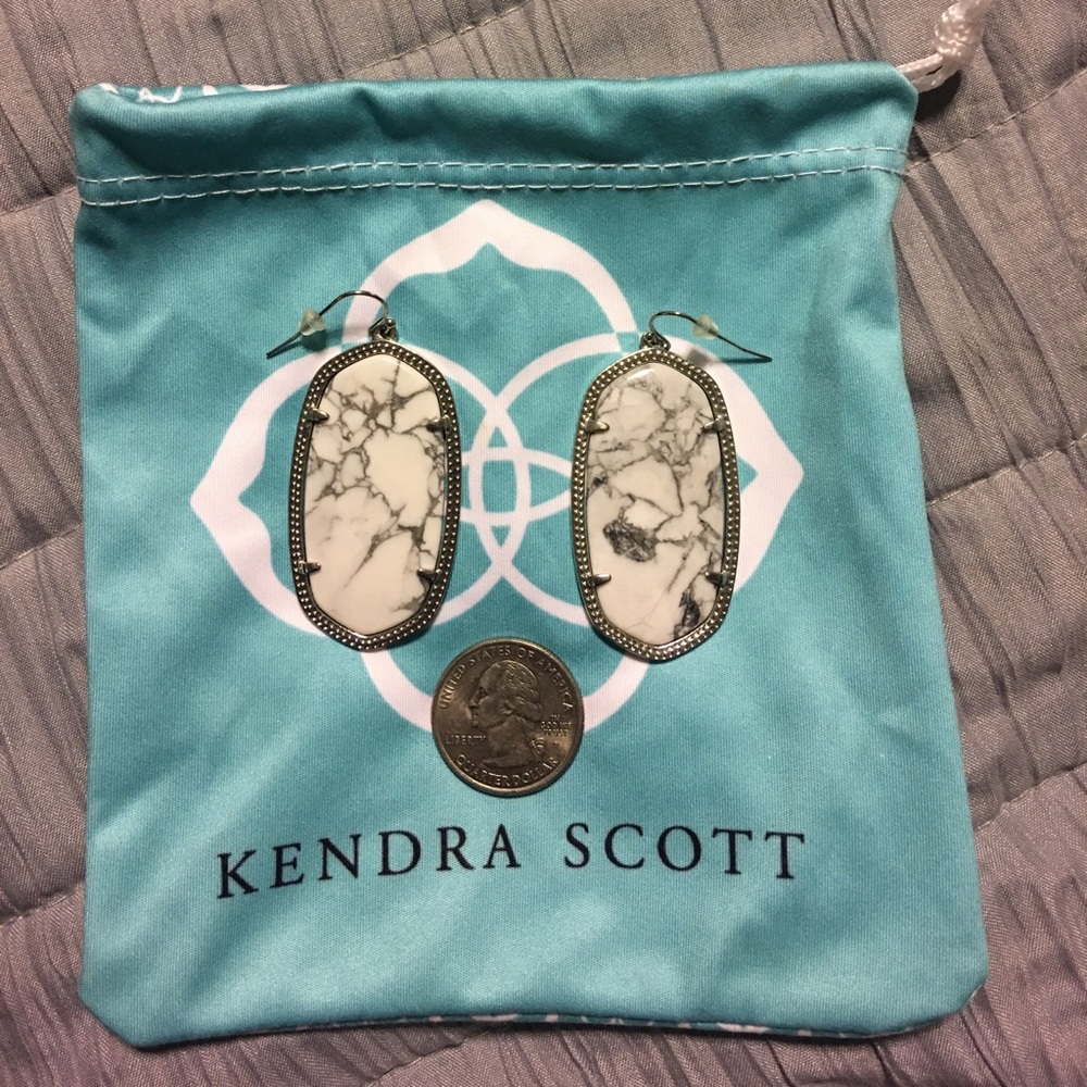 Kendra Scott silver marbled pattered earrings.