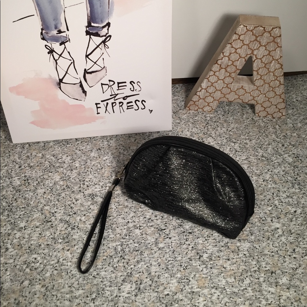 Black and silver wristlet or cosmetic bag.