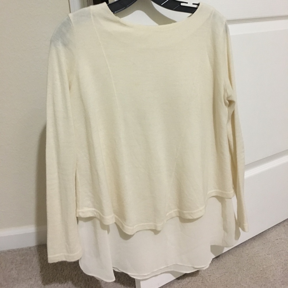 White sweater with silk/polyester layer