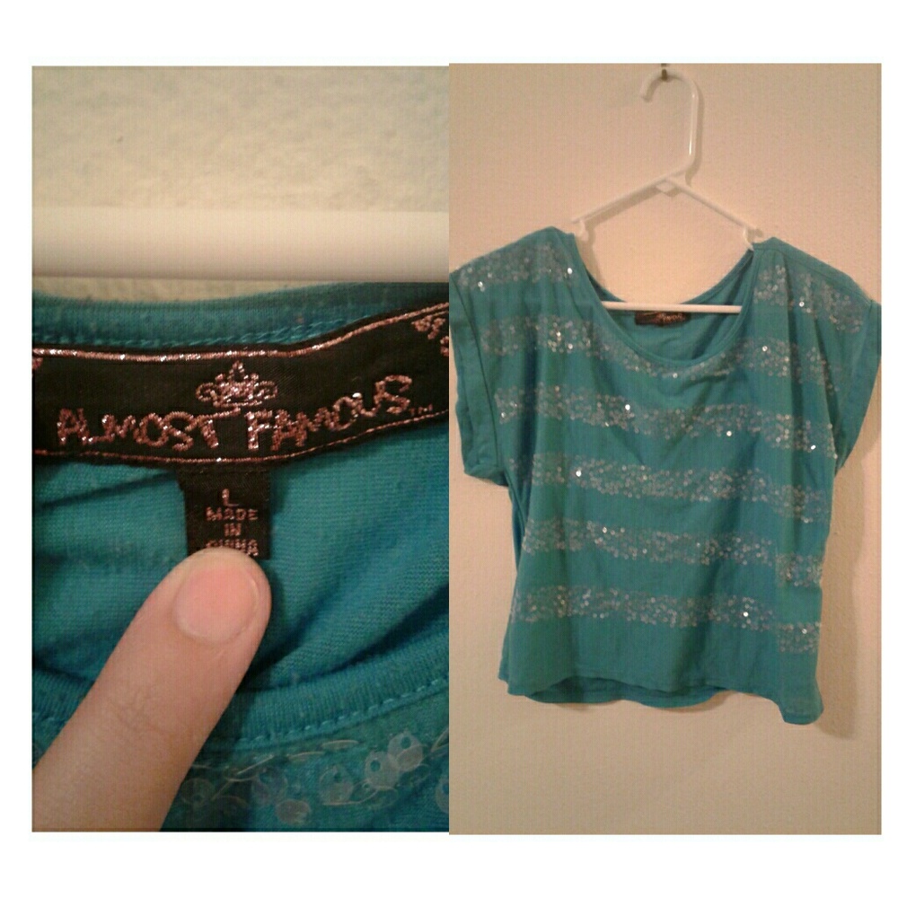 Blue sparkly crop top. In good condition.