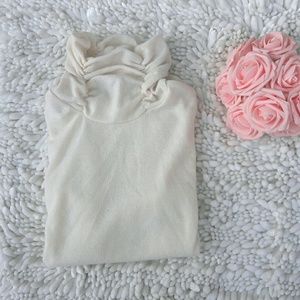 Sleeveless Turtleneck