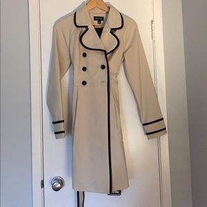 Tan trench coat with black lining
