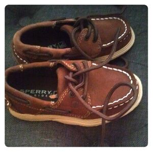 Little boy brown Sperrys