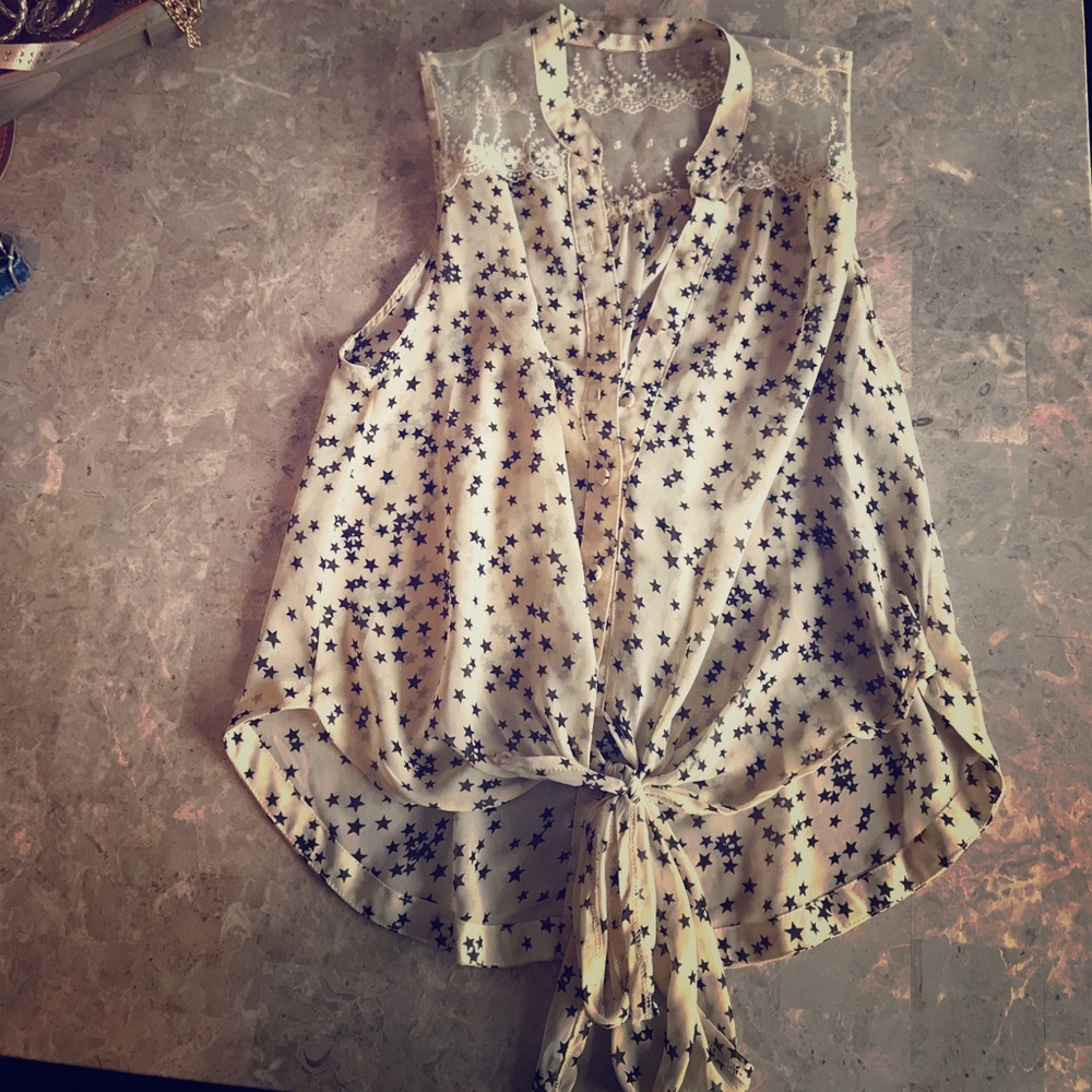 Cream and black star top with lace