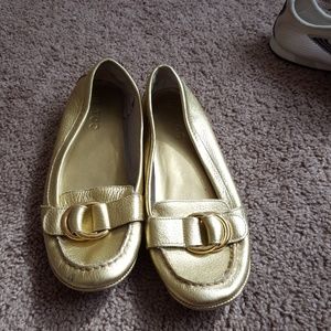 Gold loafers