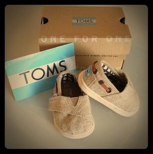 Tiny Toms burlap infant shoe