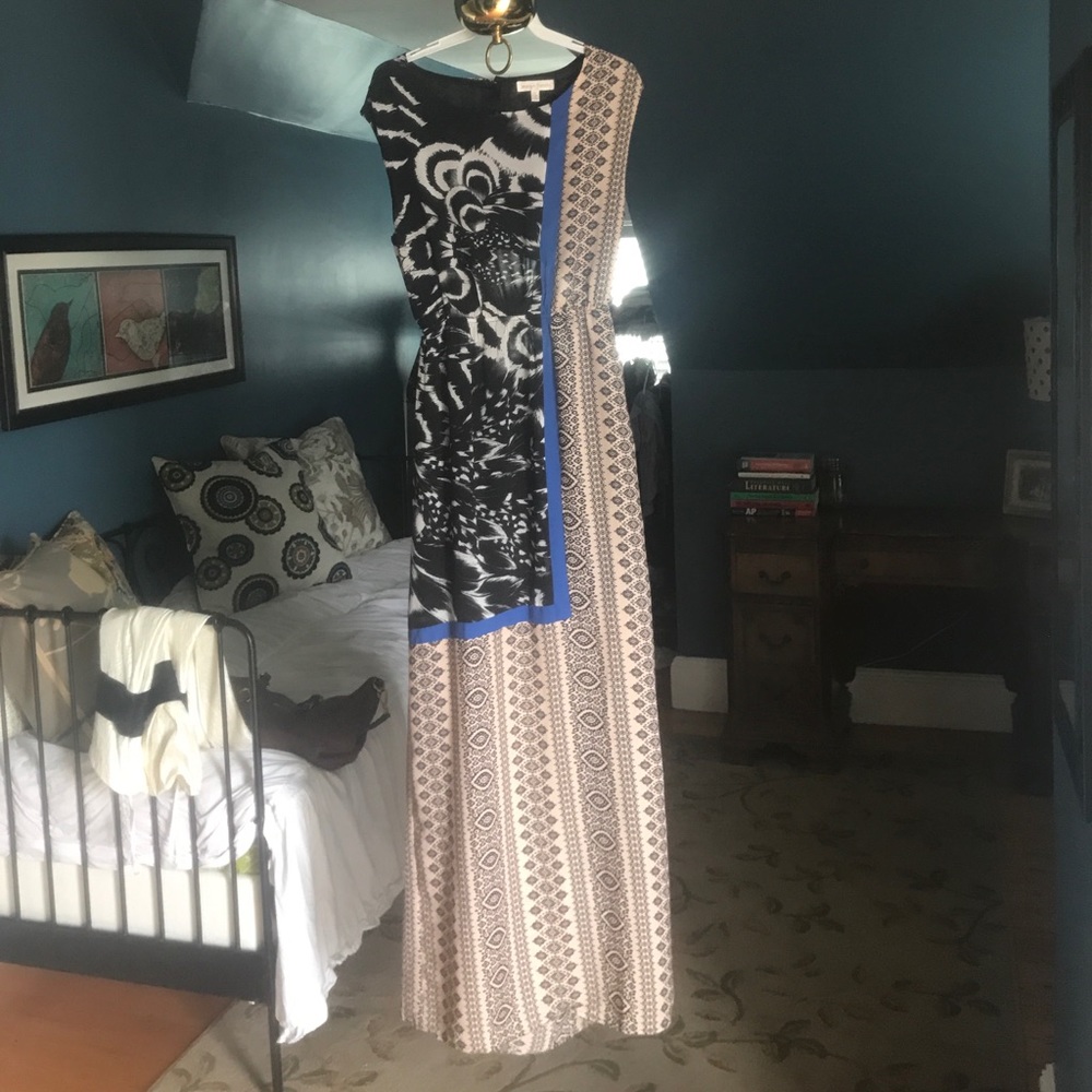 Gorgeous, slightly open-backed dress.