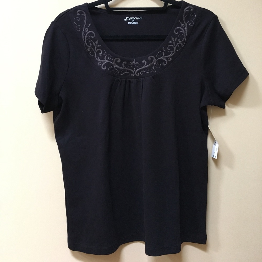 Black tee with design stitched on collar