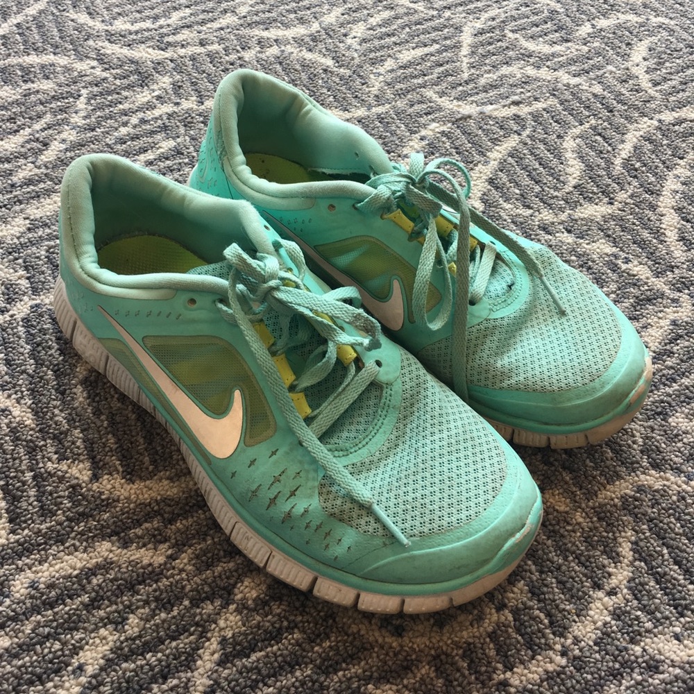 Size 8 - used Nike running shoes - blue