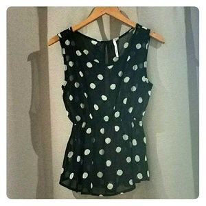 Sleeveless peplum polka dot top