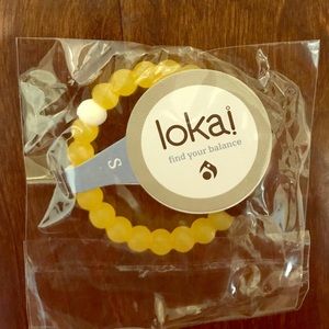 Yellow Lokai bracelet