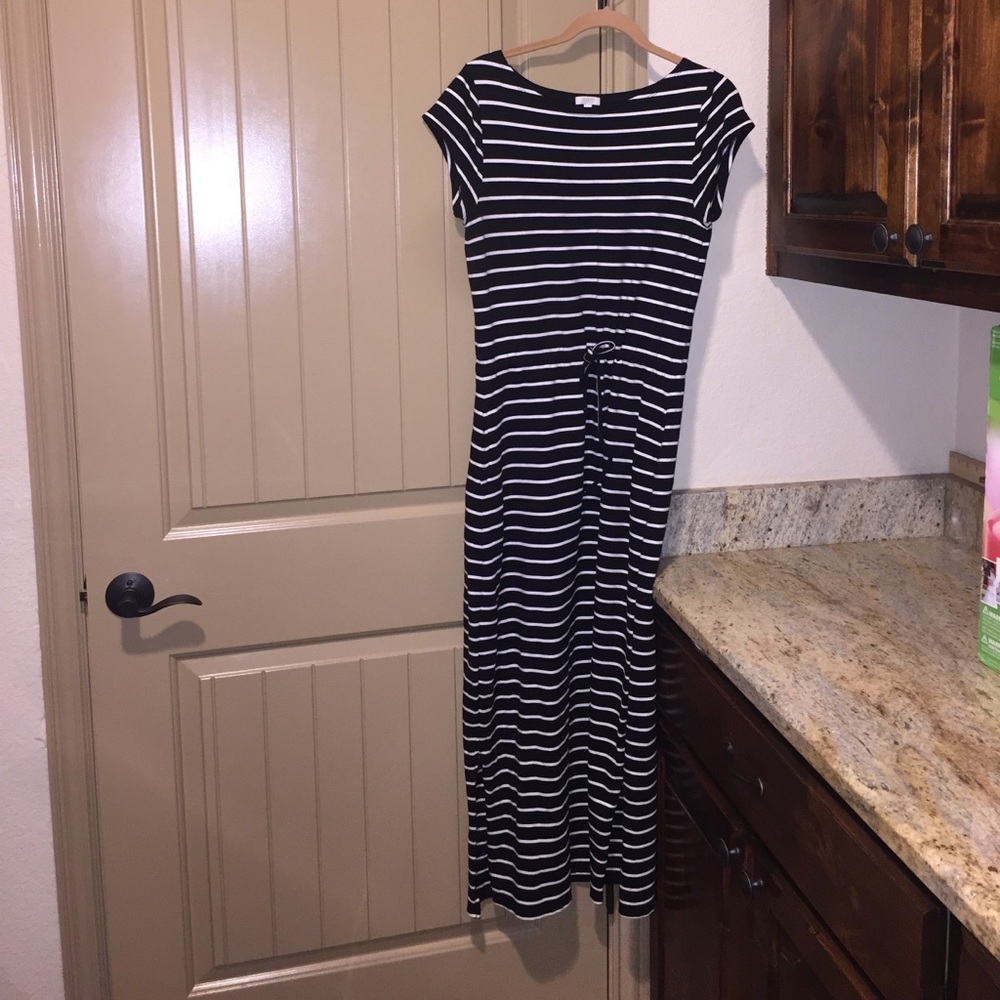 Black w/ white stripe maxi w side slit both sides.