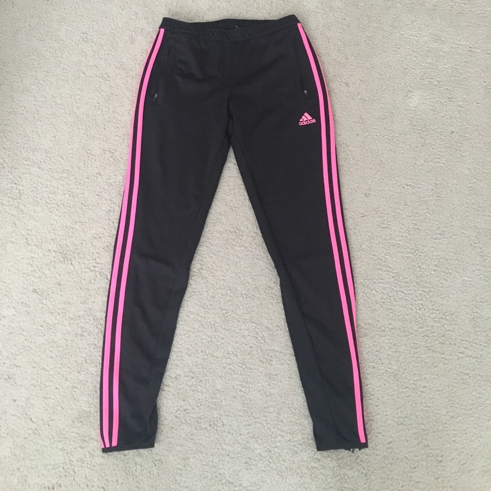 Trendy Adidas track pants with pink stripes