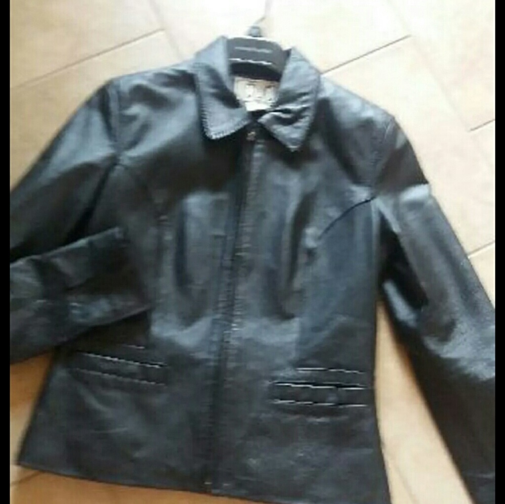 Black jacket real leather..size is 8 but runs smal