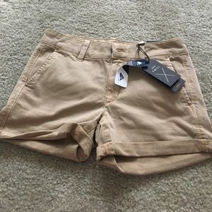 Kaki colored jean shorts