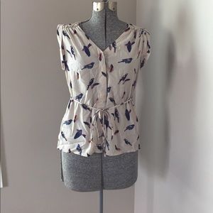 H&M tan blouse with birds and feathers