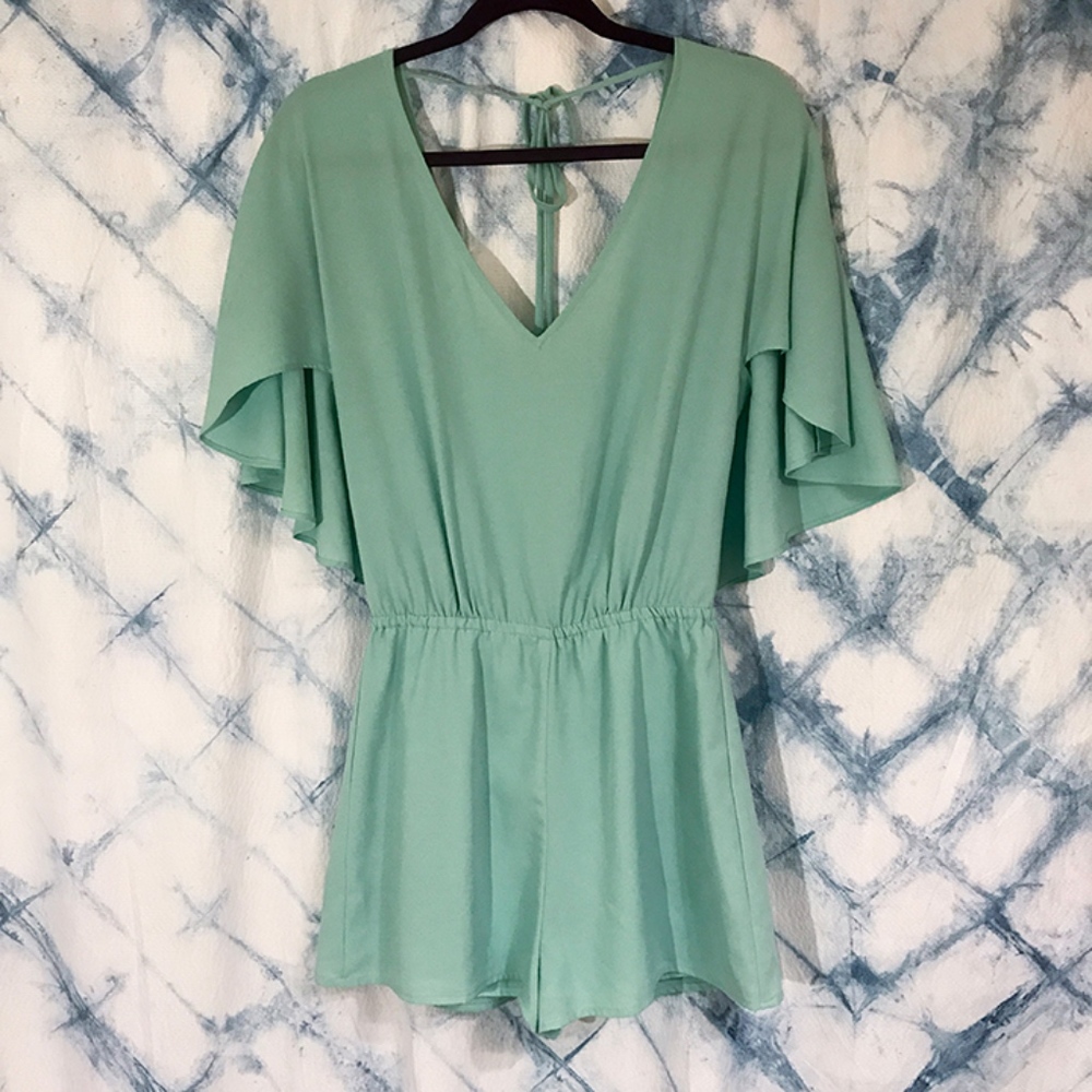 Teal romper with open back tie
