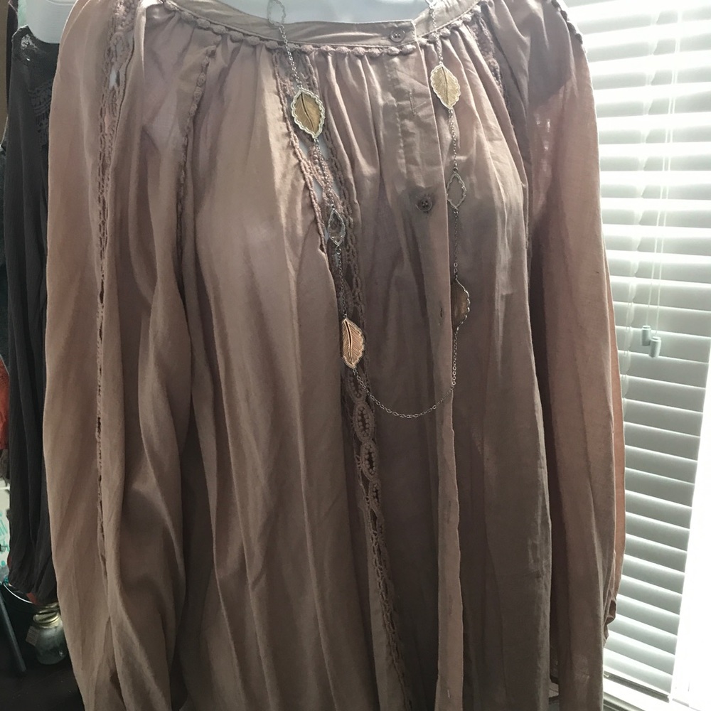 Mauve top with design down sides