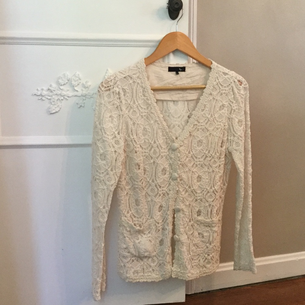 Lace, cotton and polyester, dry clean only.