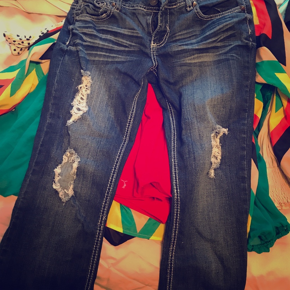 Amethyst size 9 jeans with holes.