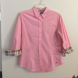 pink button down Burberry shirt