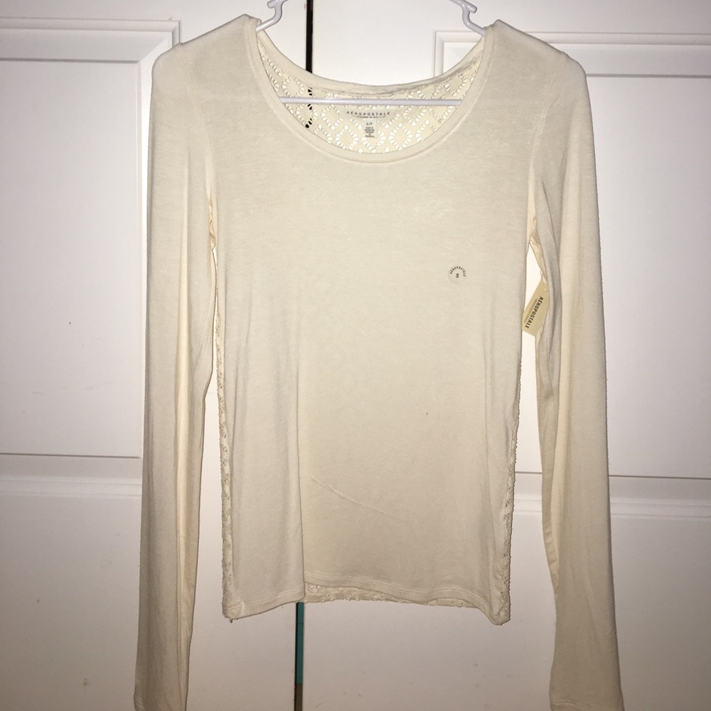 creamlong sleeved top with lace back