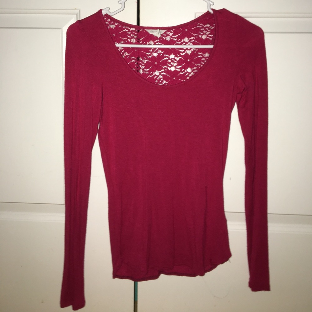 red long sleeve top with lace on the back