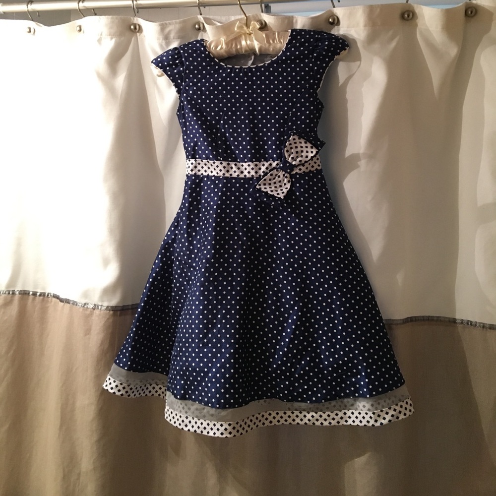 Blue dress with white polkadots size 7
