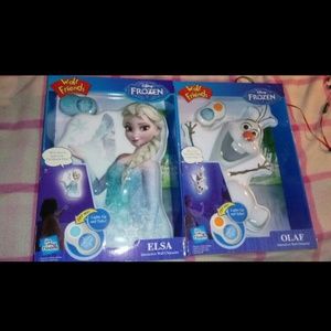 Elsa and Olaf light up/ talk wall pieces