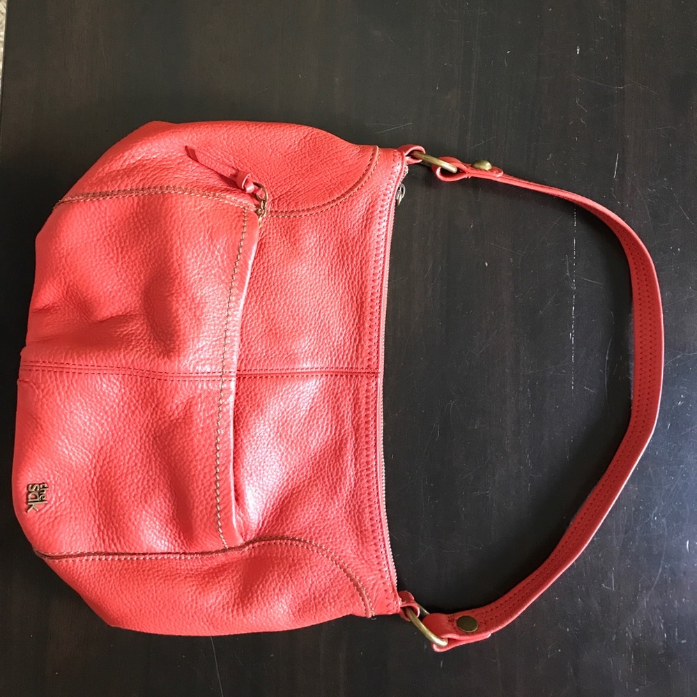 Orange leather hobo style purse