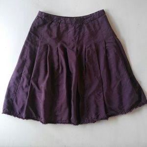 Deep plum pleated dressy midi skirt with fringe