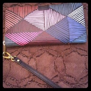 Fossil leather wallet with detachable wrist strap