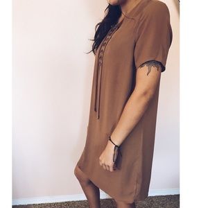 Brown dress with tie neck