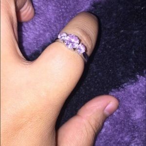 Pink ice ring with hearts on the band